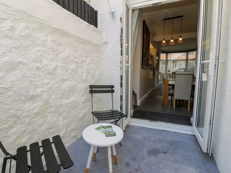 Private courtyard with bistro table off the Townhouse dining room